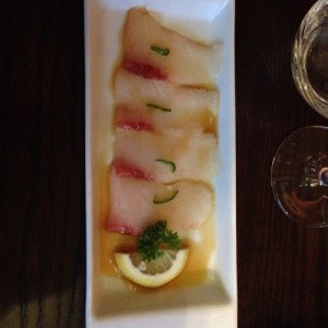 Yellow tail carpaccio with yuzu sauce, green chilli