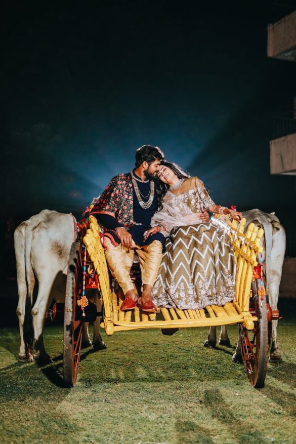 loving ethnic couple in traditional outfits