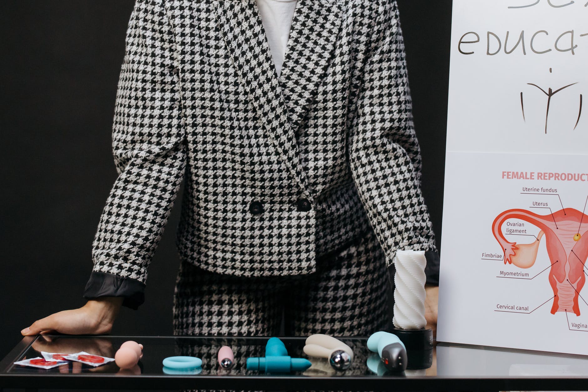 woman in black and white checkered blazer