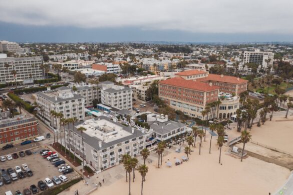 an aerial shot of buildings by the santa monica beach