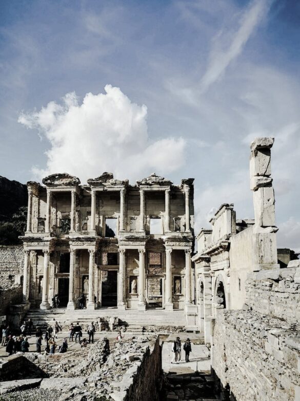 ancient library of celsus in ephesus under cloudy sky