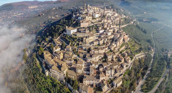 aerial view of ancient san marino city on lush hill