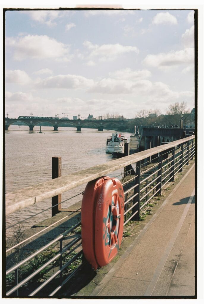 life ring on handrail of bridge