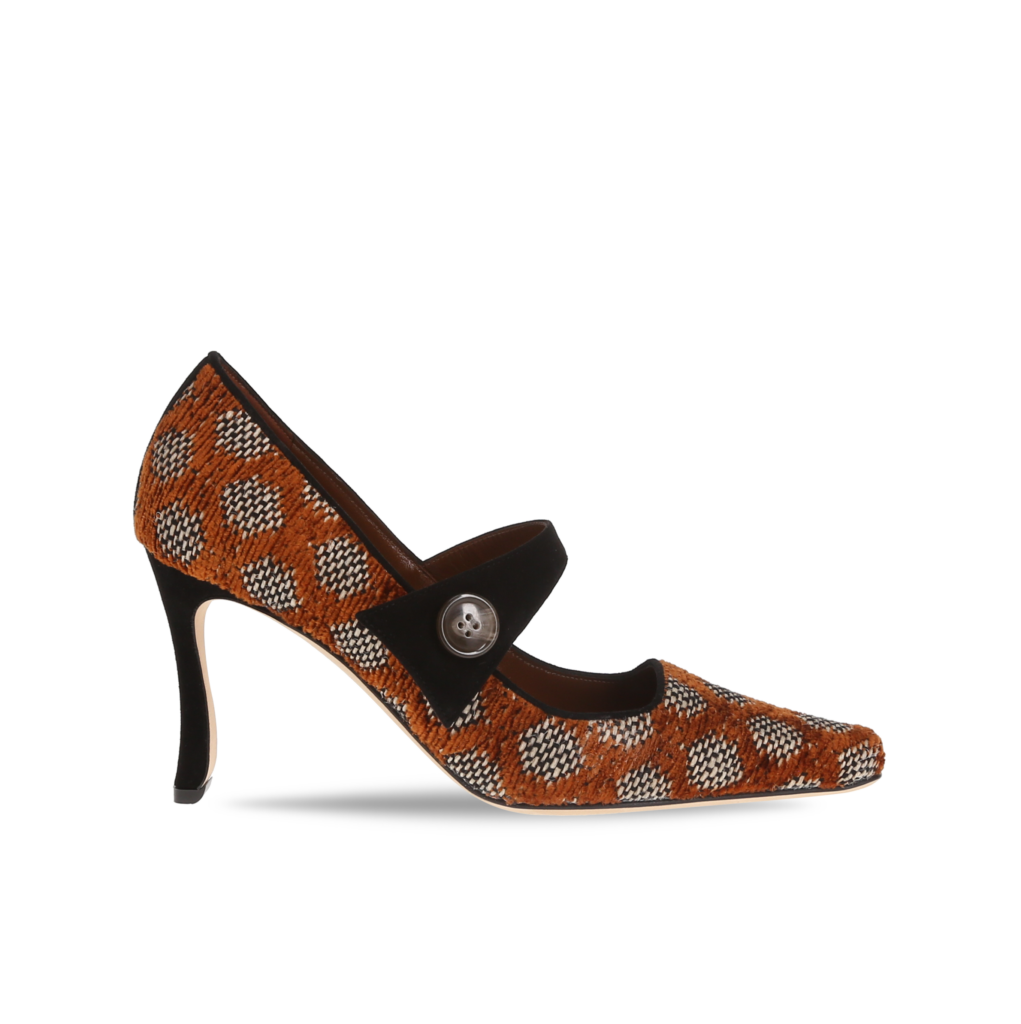 Manolo Blahnik et l’art de marcher : Paris comme carte personnelle 125 PETRONIA RAFFIA ORANGE BLACK