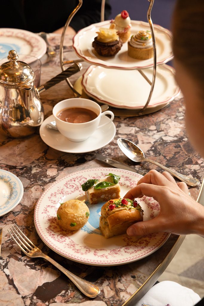 At the Crillon, Manolo Blahnik gives Marie-Antoinette’s afternoon tea a makeover 30 RWCRI Restaurant JardinDHiver Teatime Marie Antoinette ManoloBlahnikPartnership table food
