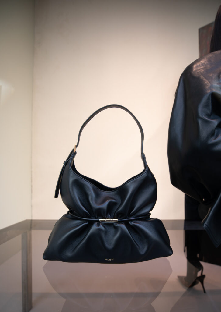 At Balmain, the window display depicts a disappearance 28 Saint Honore Closeup 1